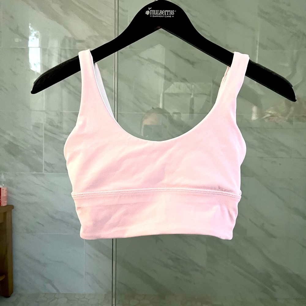 Light pink lululemon sports bra/crop top, size 4. Never worn!